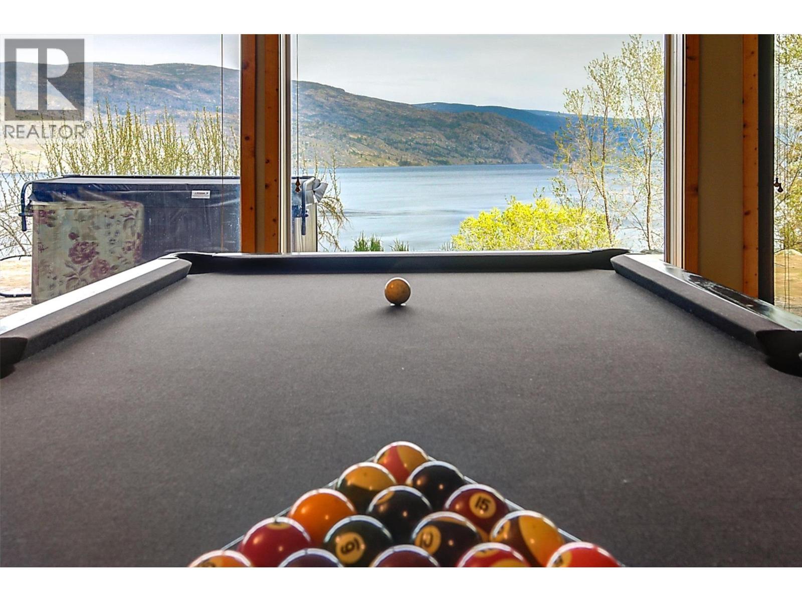 Billiards with a view! - 7172 Brent Road, Peachland, BC - Photo Showing Other Room With Body Of Water