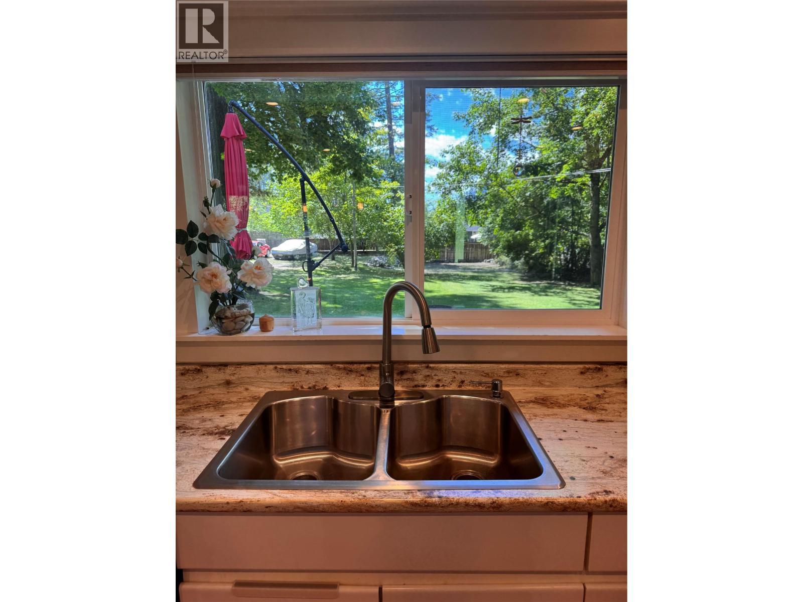 9&11 Kingsley Road, Christina Lake, BC - Indoor Photo Showing Kitchen With Double Sink
