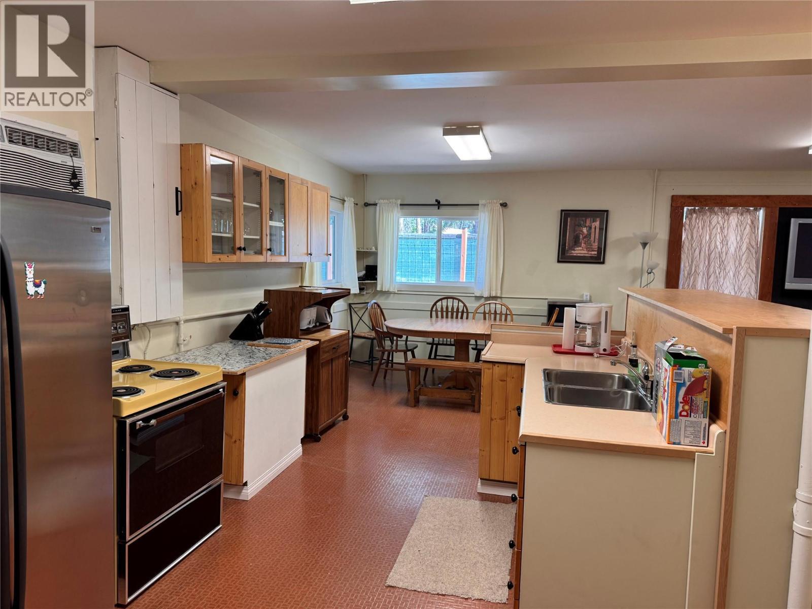 9&11 Kingsley Road, Christina Lake, BC - Indoor Photo Showing Kitchen With Double Sink