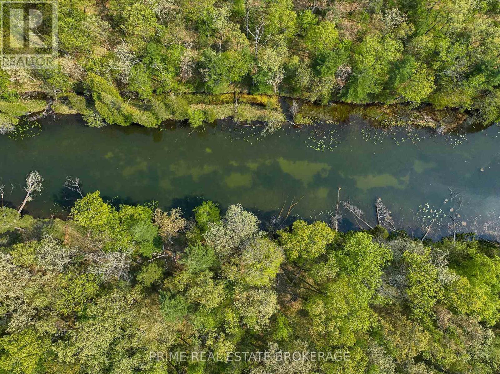 Ausable Channel running through Pinery Park - 10142 Pinery Bluffs Road, Lambton Shores, ON - Outdoor With Body Of Water With View