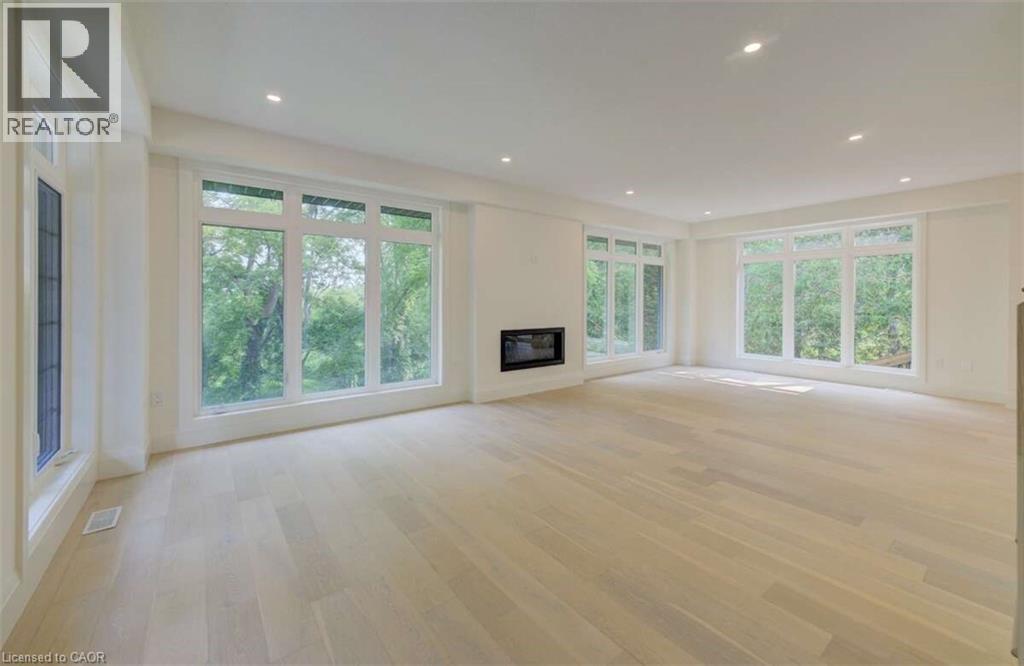 88 Misty River Drive, Conestogo, ON - Indoor Photo Showing Living Room With Fireplace