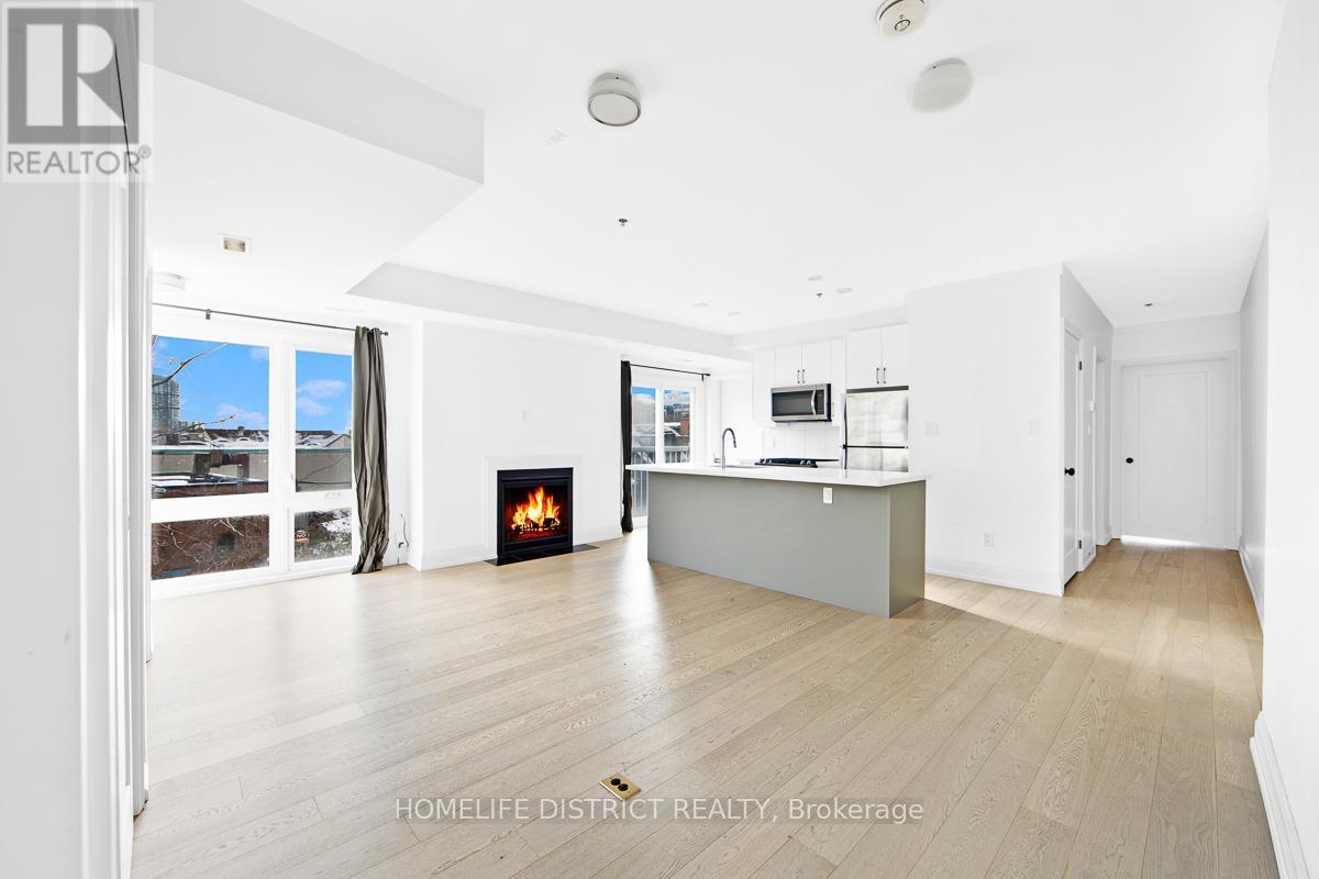 300 - 243 Niagara Street, Toronto, ON - Indoor With Fireplace