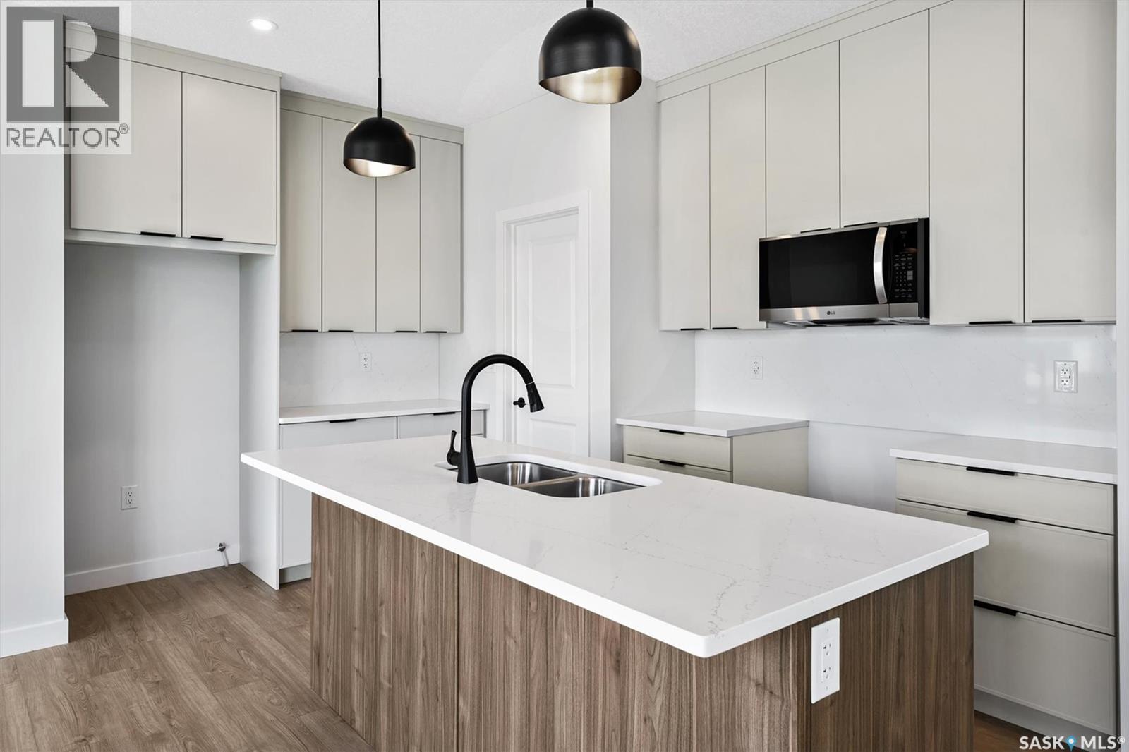 127 Katz Avenue, Saskatoon, SK - Indoor Photo Showing Kitchen With Double Sink