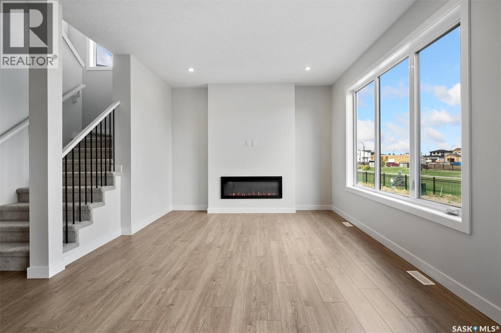 127 Katz Avenue, Saskatoon, SK - Indoor With Fireplace