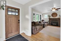 Front entrance way leading to living room -