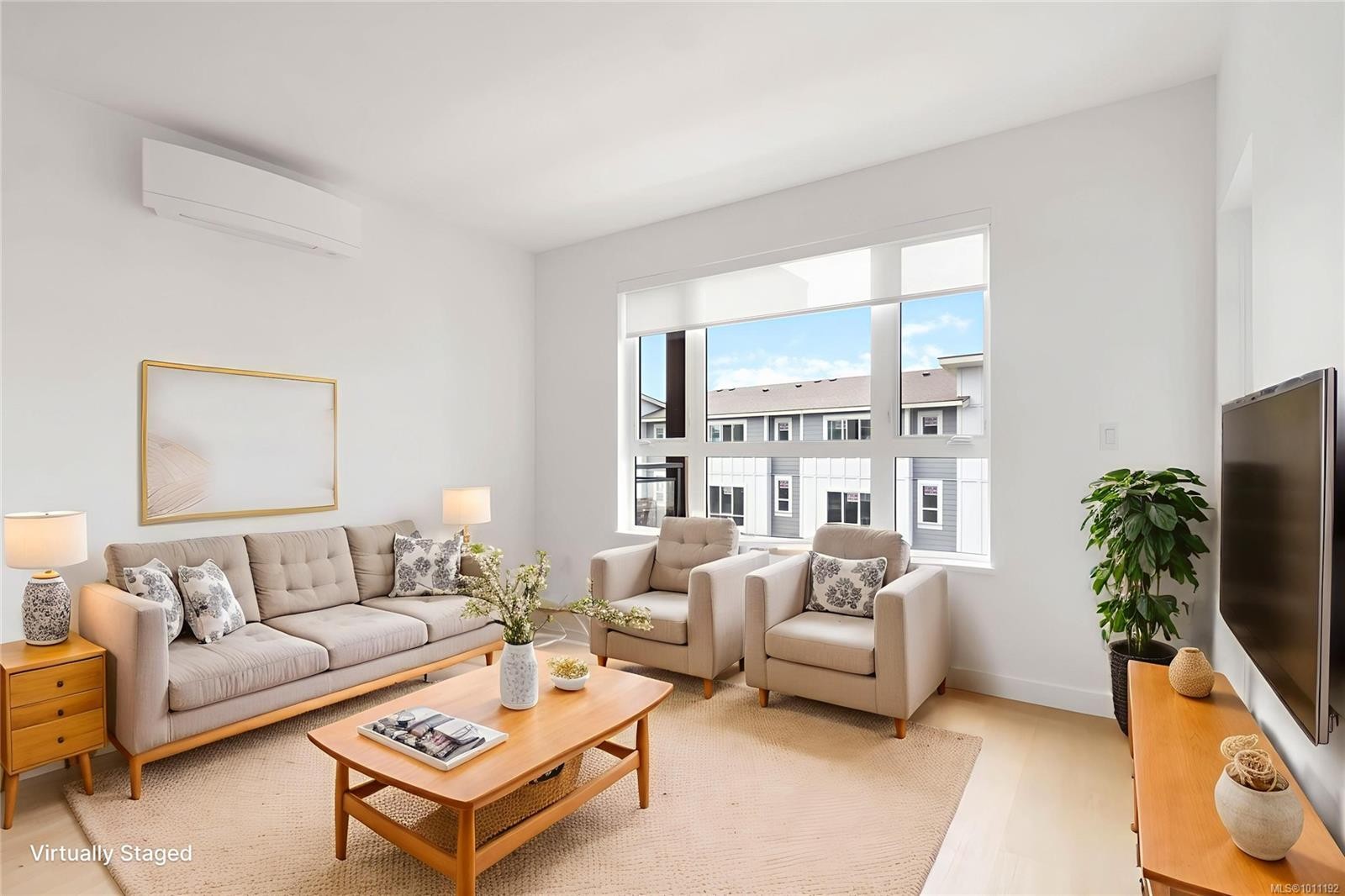 304-3564 A Ryder Hesjedal Way, Colwood, BC - Indoor Photo Showing Living Room