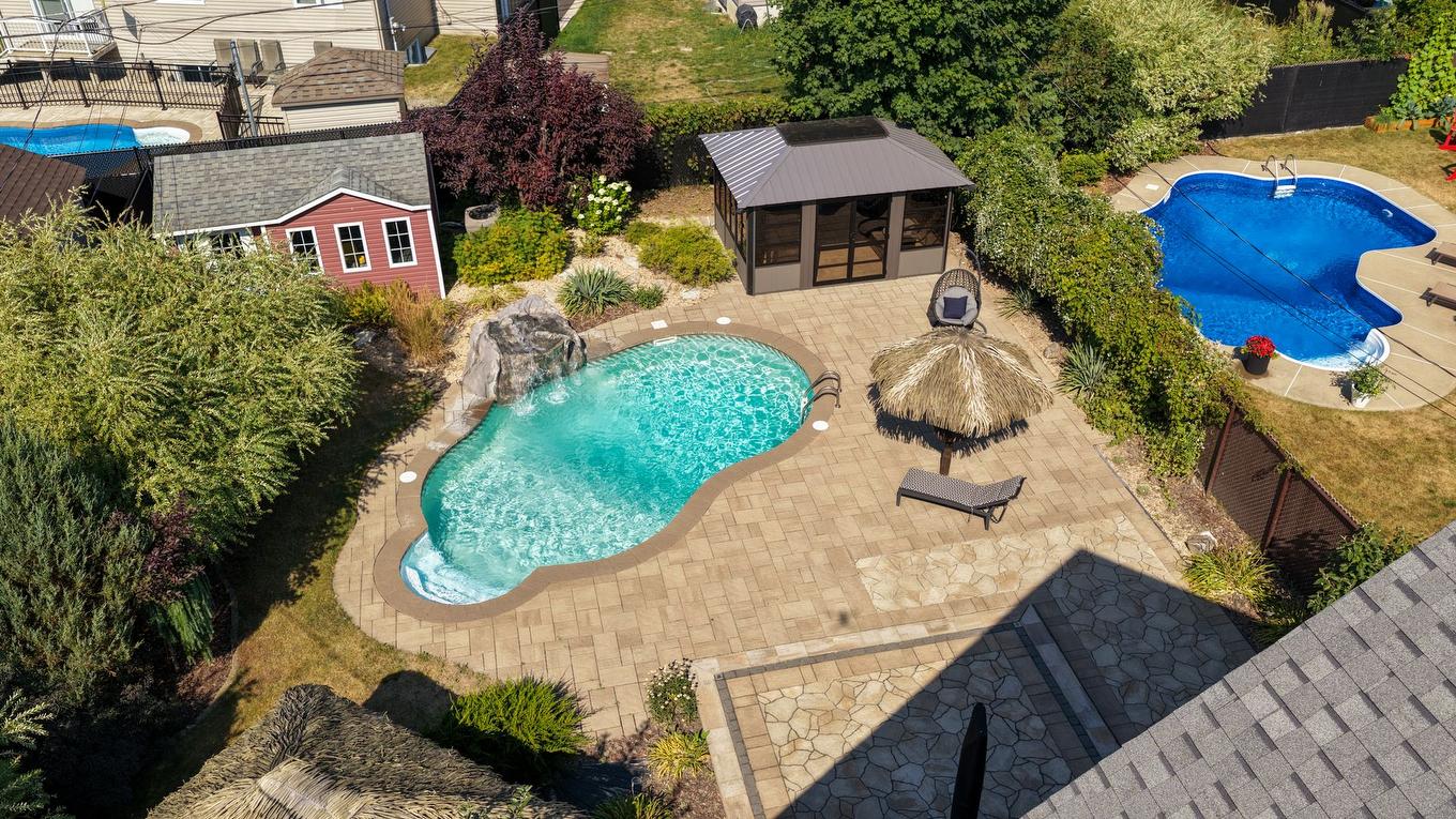Backyard - 1 Rue Antoine-Couillard, Mercier, QC - Outdoor With In Ground Pool