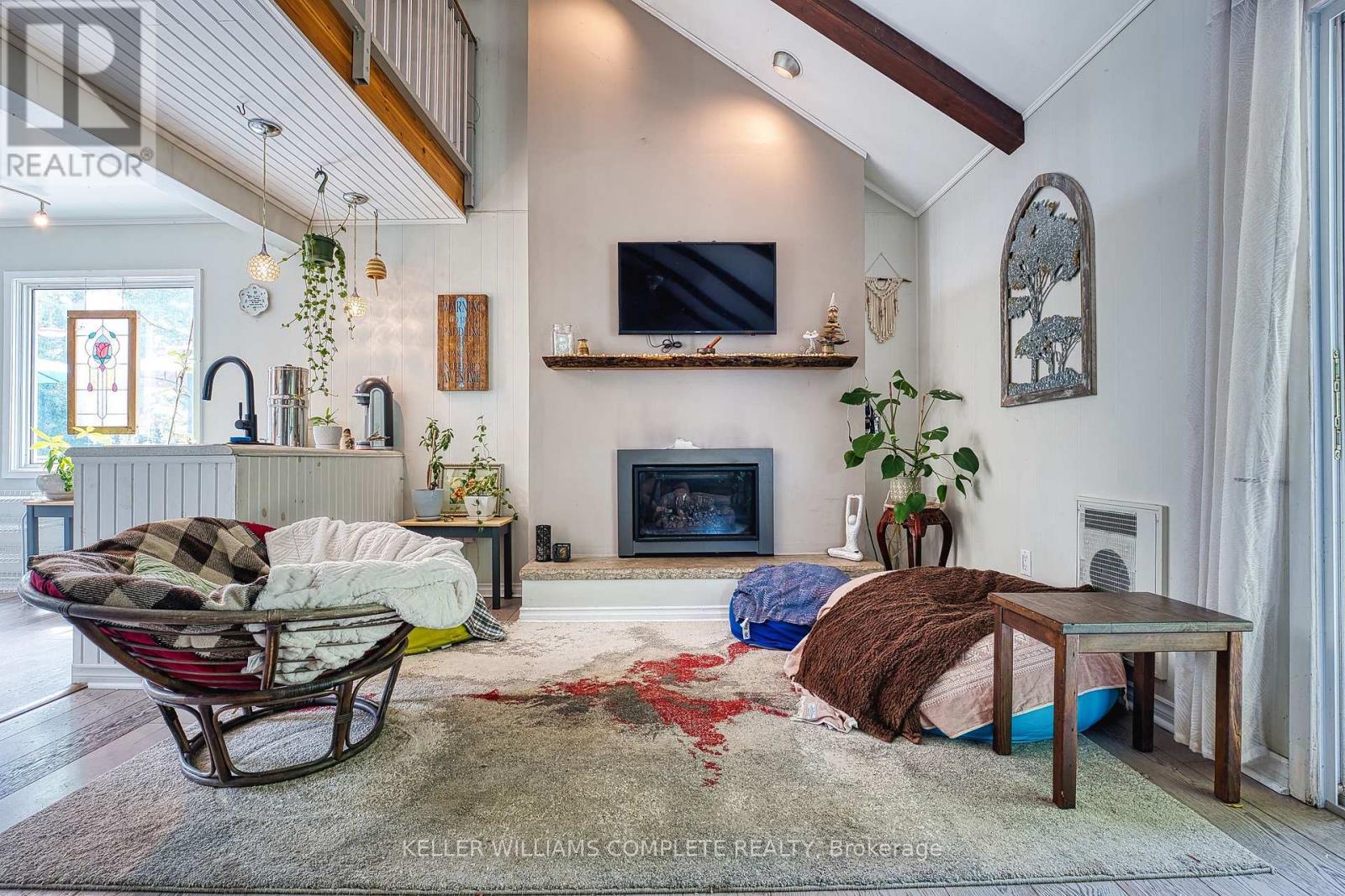 74434 Woodland Drive, Bluewater, ON - Indoor Photo Showing Living Room With Fireplace