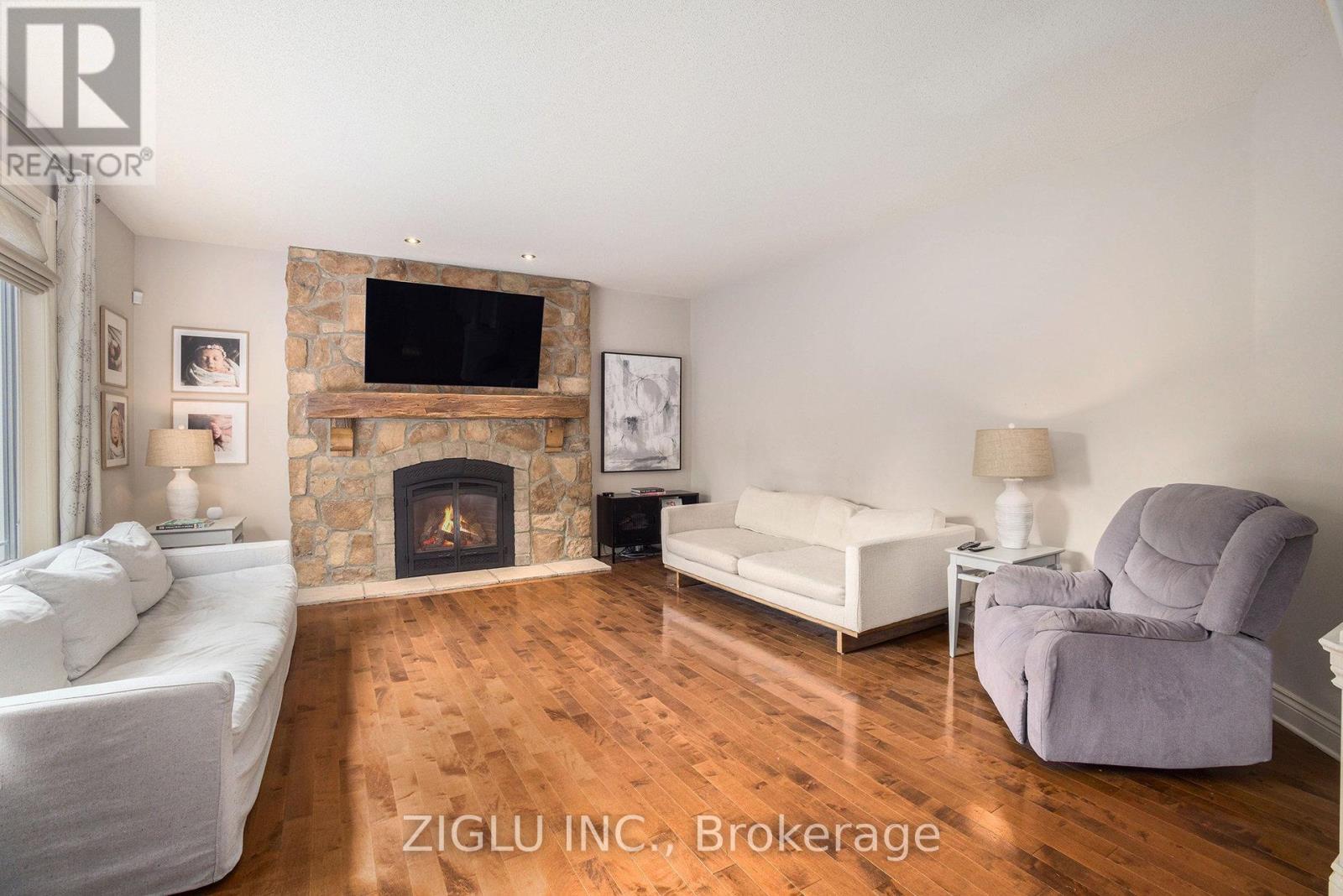 38 Oradea Crescent, Ottawa, ON - Indoor Photo Showing Living Room With Fireplace