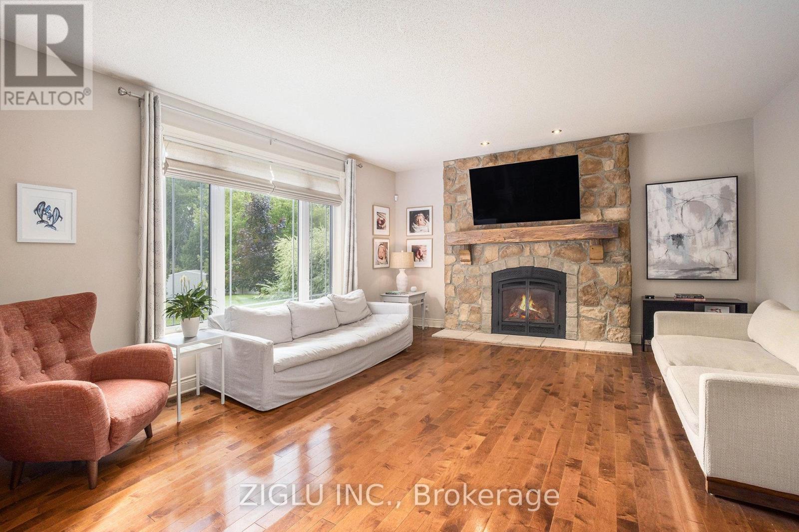 38 Oradea Crescent, Ottawa, ON - Indoor Photo Showing Living Room With Fireplace