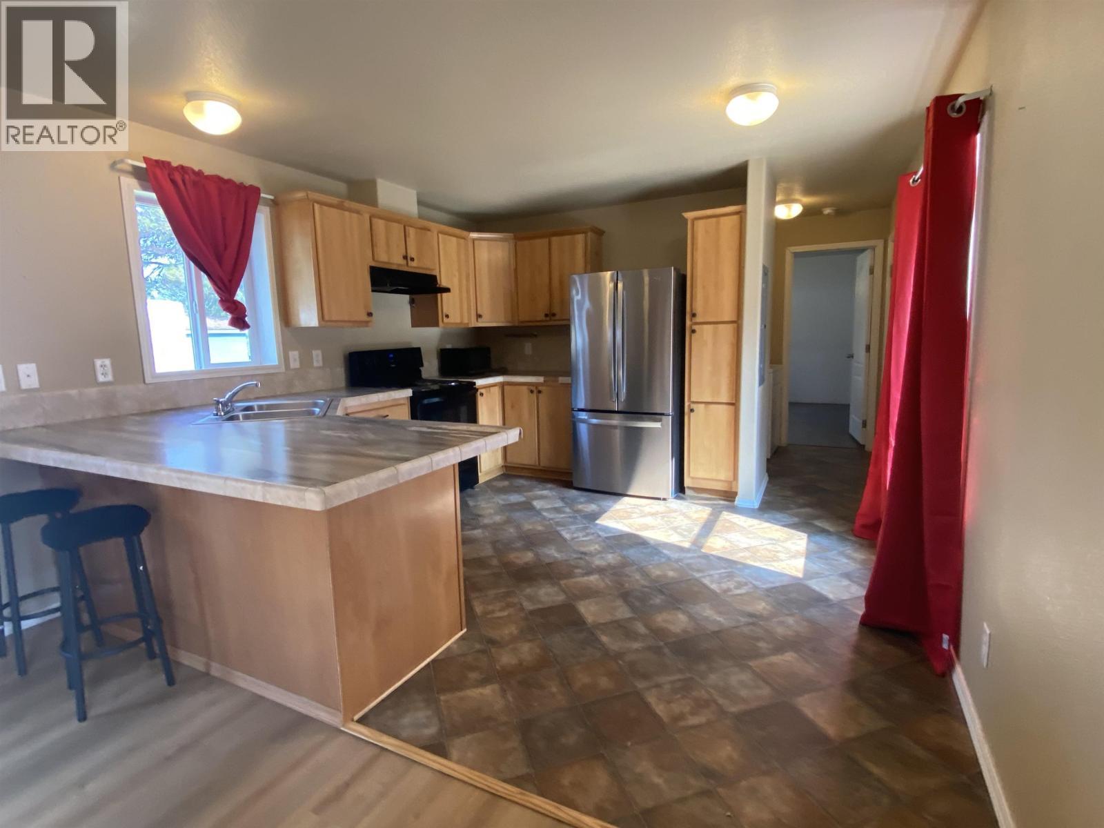71 3889 Muller Avenue, Terrace, BC - Indoor Photo Showing Kitchen With Double Sink