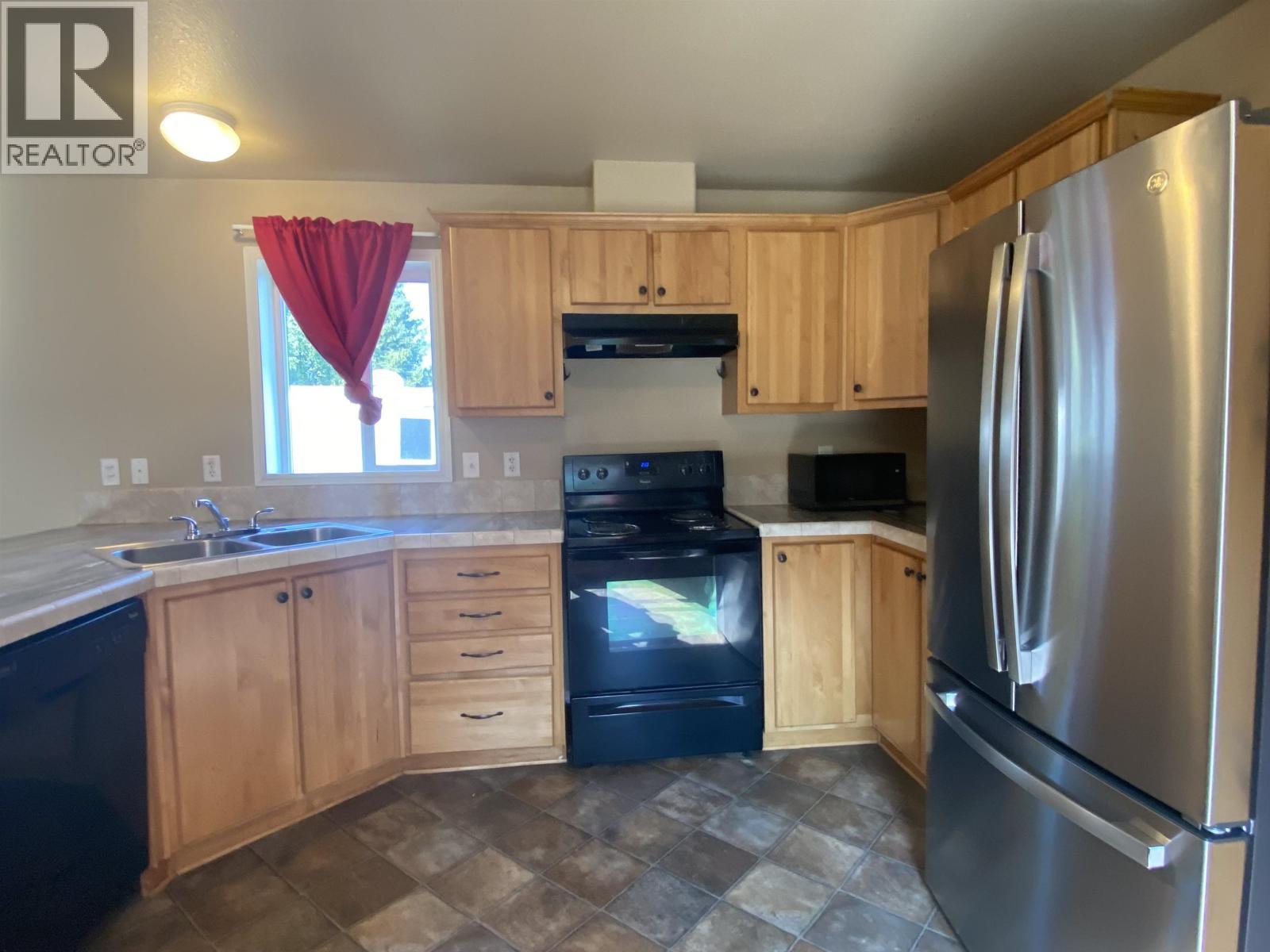 71 3889 Muller Avenue, Terrace, BC - Indoor Photo Showing Kitchen With Double Sink