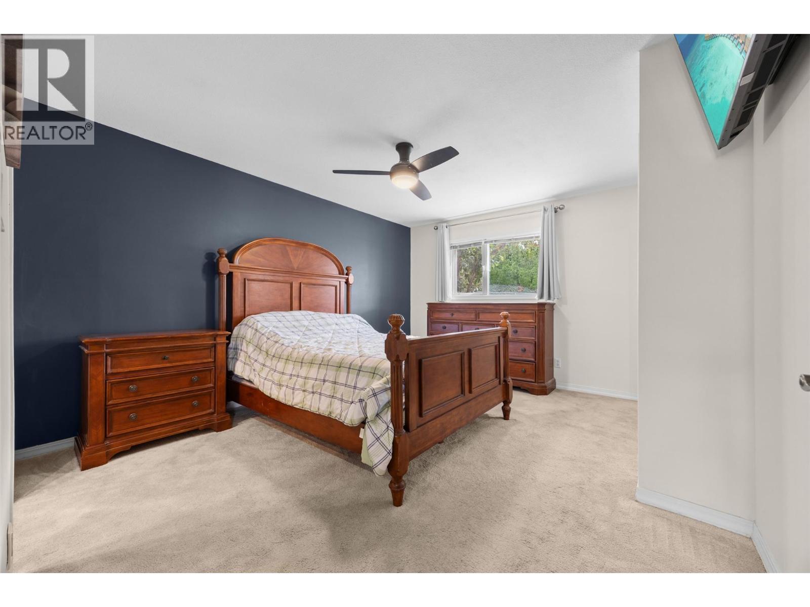 Primary - 6400 Spencer Road Unit# 8, Kelowna, BC - Indoor Photo Showing Bedroom