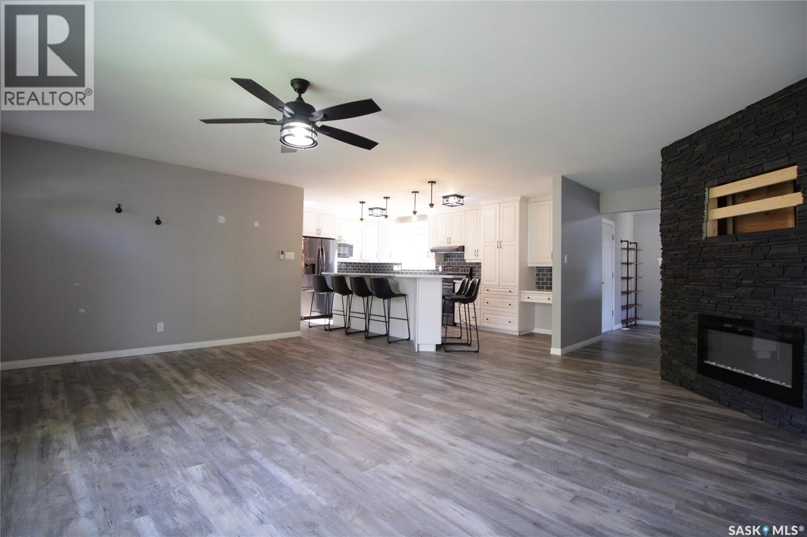 813 Moose Street, Moosomin, SK - Indoor Photo Showing Living Room With Fireplace