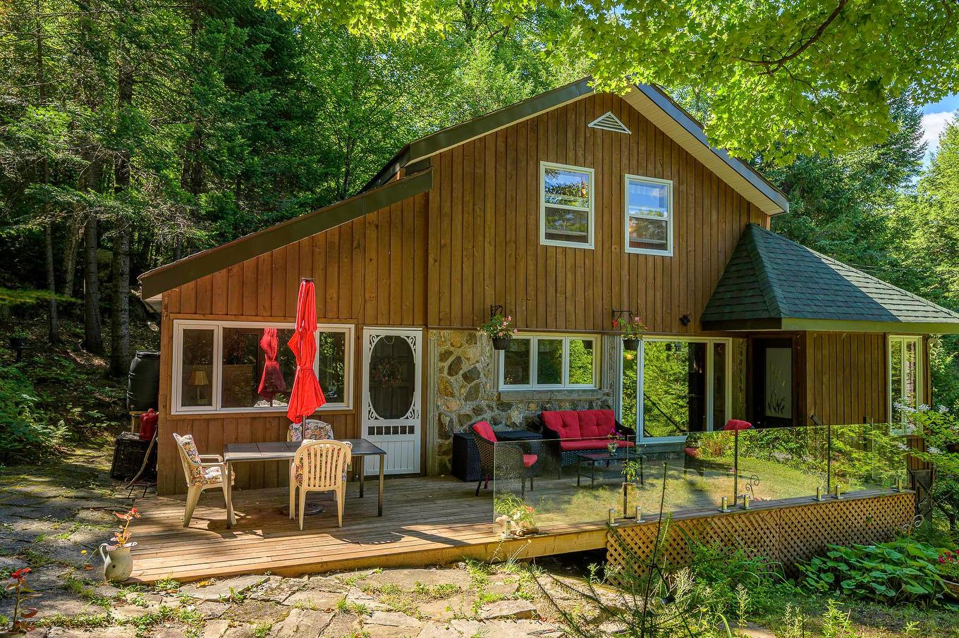 Back facade - 16 Ch. Des Oliviers, Sainte-Anne-Des-Lacs, QC - Outdoor With Deck Patio Veranda