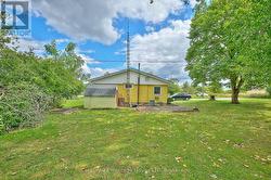 Side view of the house and shed -