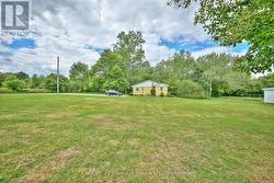 Large property and view of house from the backyard -