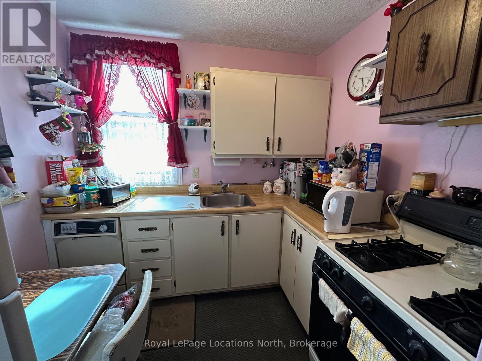 204 - 110 Sykes Street N, Meaford, ON - Indoor Photo Showing Kitchen With Double Sink