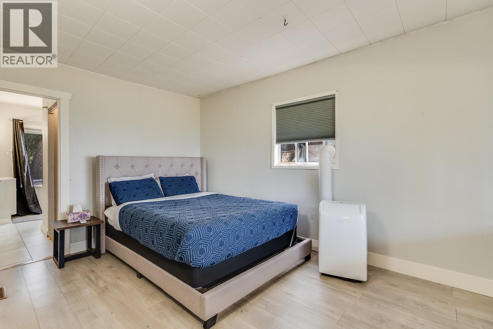 1293 Highway 33 E, Kelowna, BC - Indoor Photo Showing Bedroom