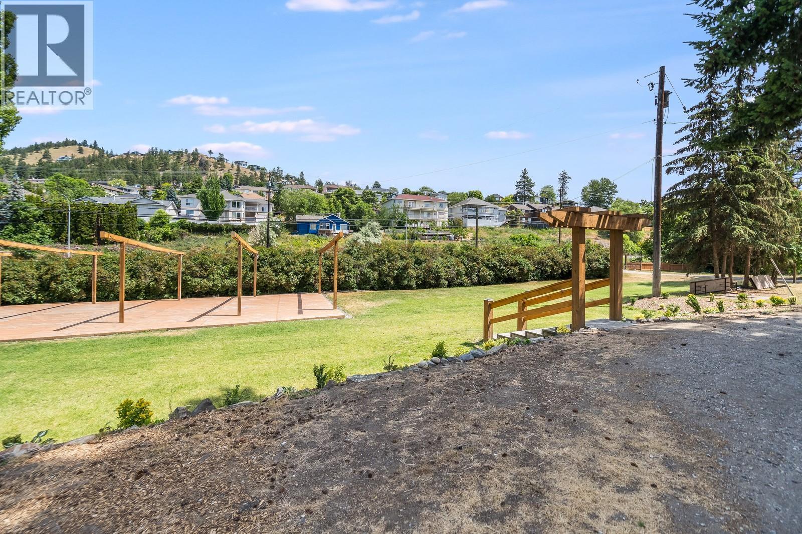 lower flat area set up for weddings and events - 1293 Highway 33 E, Kelowna, BC - Outdoor With View