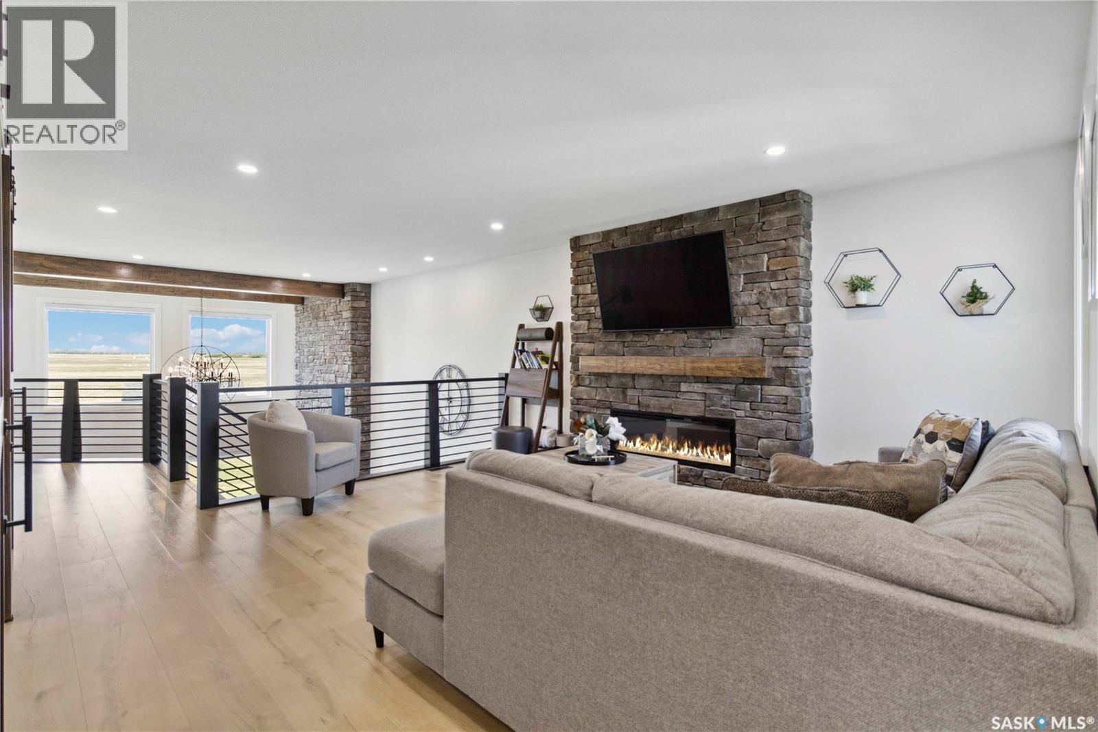 416 Woolf Bend, Saskatoon, SK - Indoor Photo Showing Living Room With Fireplace