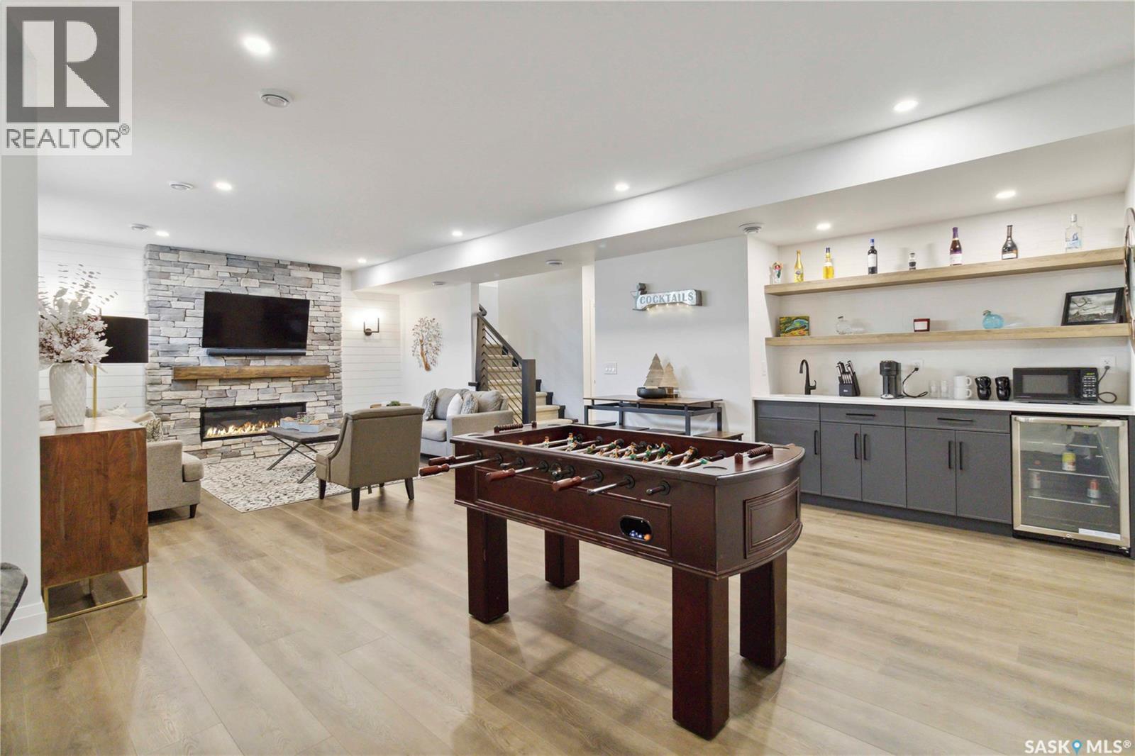 416 Woolf Bend, Saskatoon, SK - Indoor With Fireplace