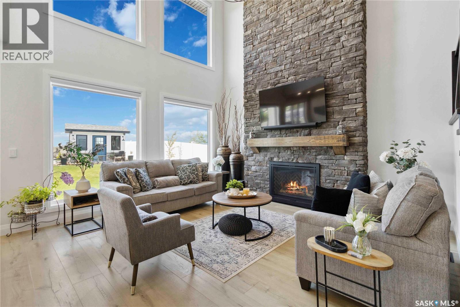 416 Woolf Bend, Saskatoon, SK - Indoor Photo Showing Living Room With Fireplace