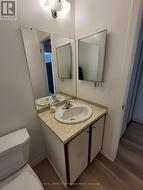 Powder room with newer sink and taps. -