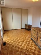 Primary bedroom with wall to wall closets. -