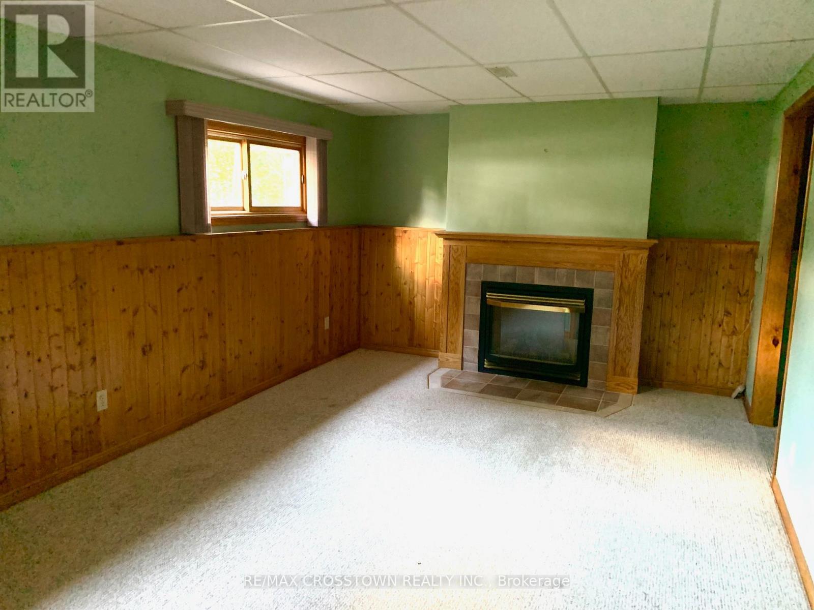 43 Foyston Park Circle, Springwater, ON - Indoor With Fireplace