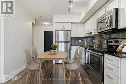VIRTUALLY STAGED - Kitchen from Living area -