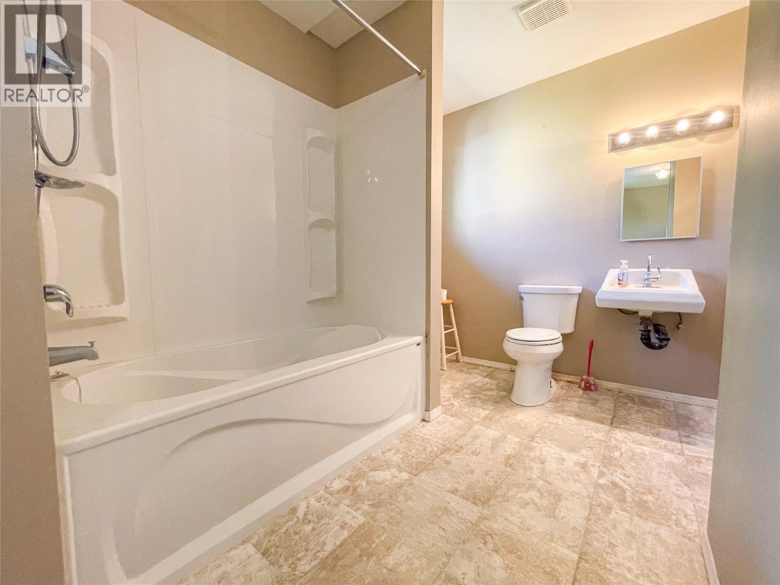 4810 48 Avenue, Pouce Coupe, BC - Indoor Photo Showing Bathroom