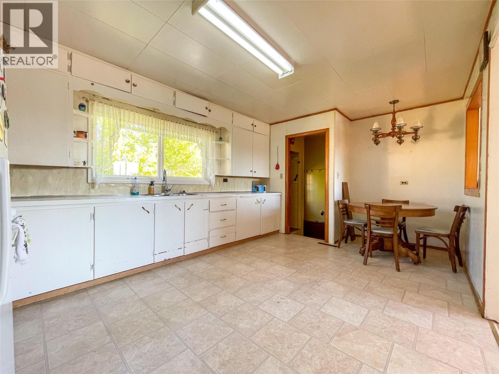 4810 48 Avenue, Pouce Coupe, BC - Indoor Photo Showing Kitchen