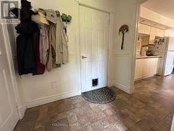 Garage Access into laundry room area. -