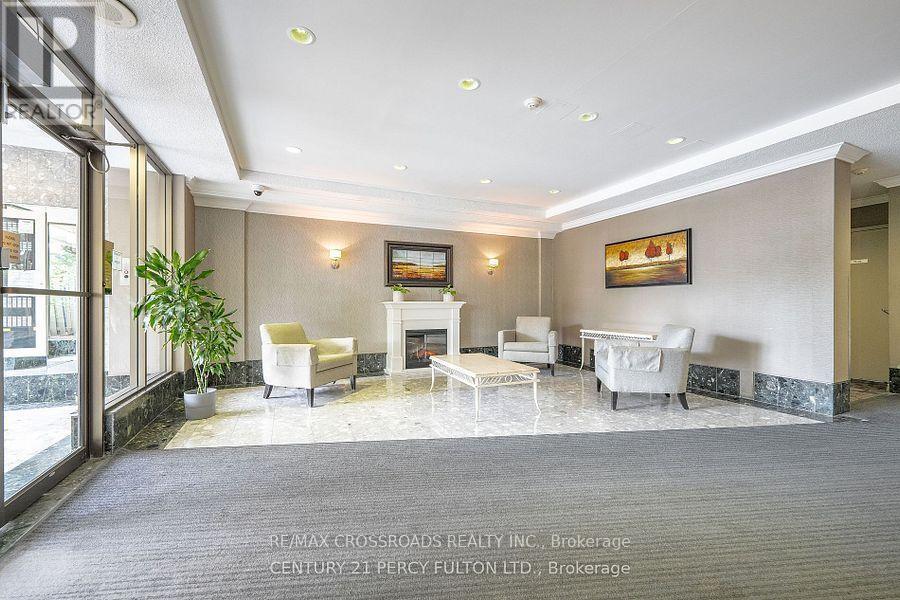 1228 - 3 Greystone Walk Drive, Toronto, ON - Indoor Photo Showing Other Room With Fireplace