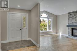 foyer and sun filled living room -