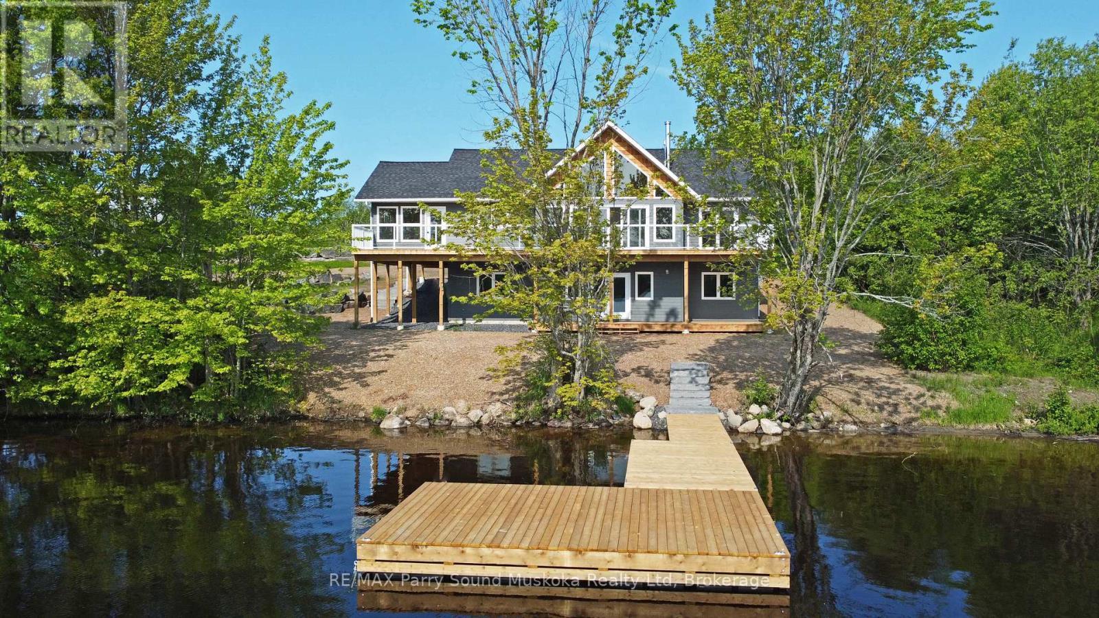 293 ft Waterfront - 49 Hardies Road, Mckellar, ON - Outdoor With Body Of Water