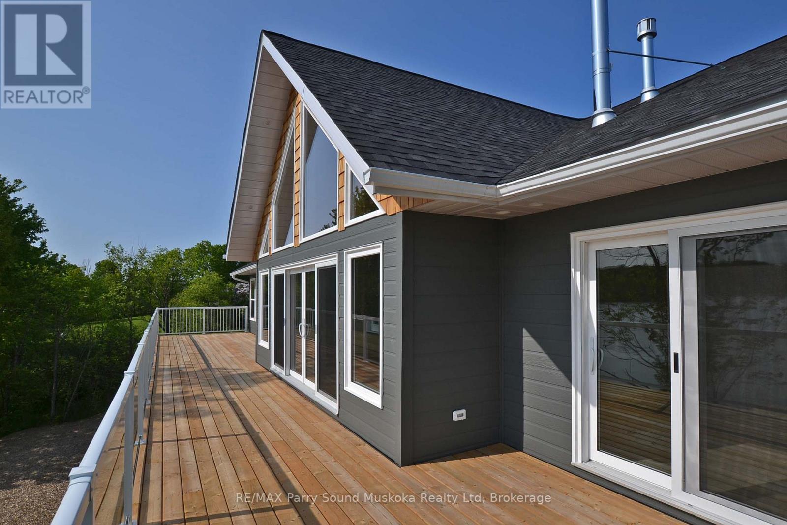 Expansive sundeck - 49 Hardies Road, Mckellar, ON - Outdoor With Deck Patio Veranda With Exterior
