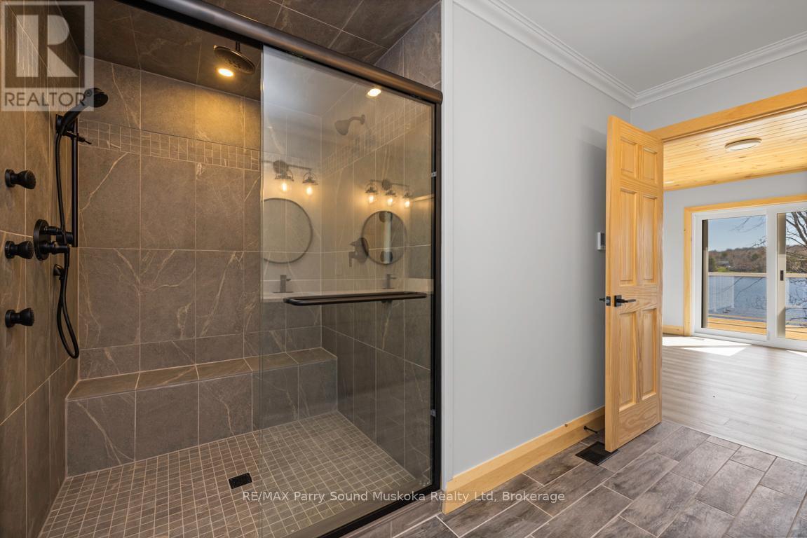 Generous shower in ensuite bath - 49 Hardies Road, Mckellar, ON - Indoor Photo Showing Bathroom