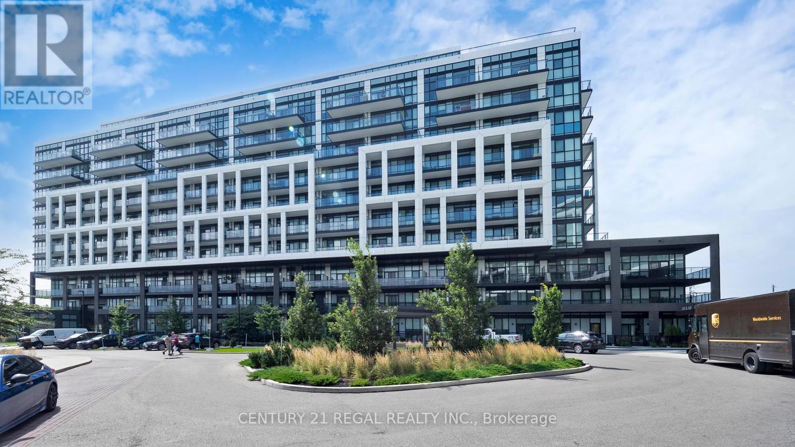 314 - 50 George Butchart Drive, Toronto, ON - Outdoor With Balcony With Facade