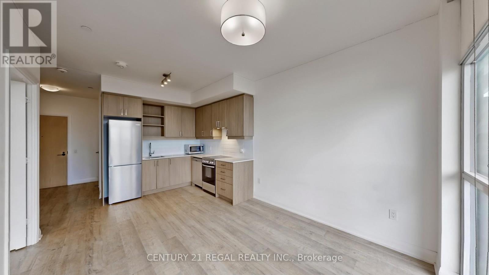 314 - 50 George Butchart Drive, Toronto, ON - Indoor Photo Showing Kitchen