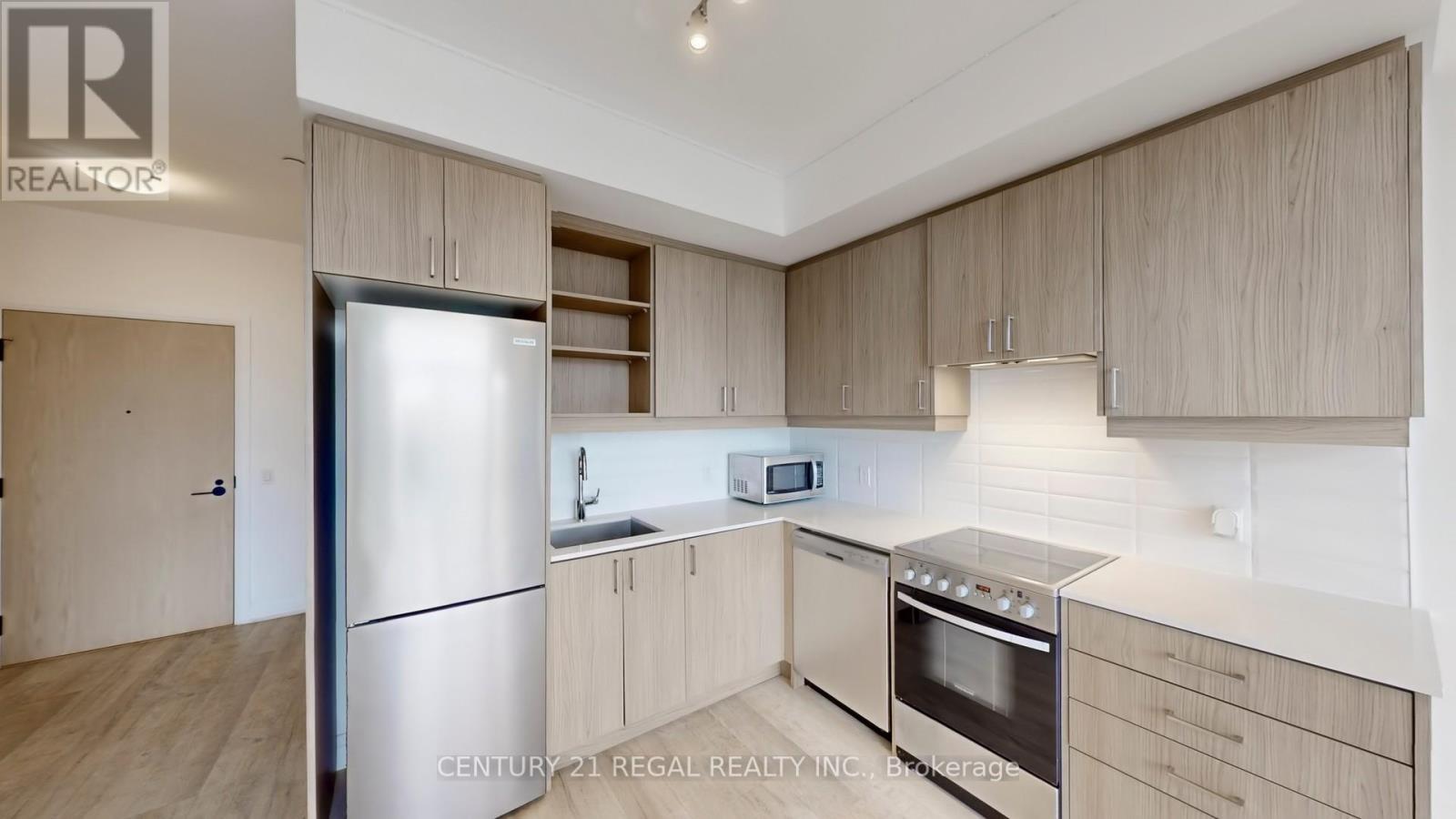 314 - 50 George Butchart Drive, Toronto, ON - Indoor Photo Showing Kitchen