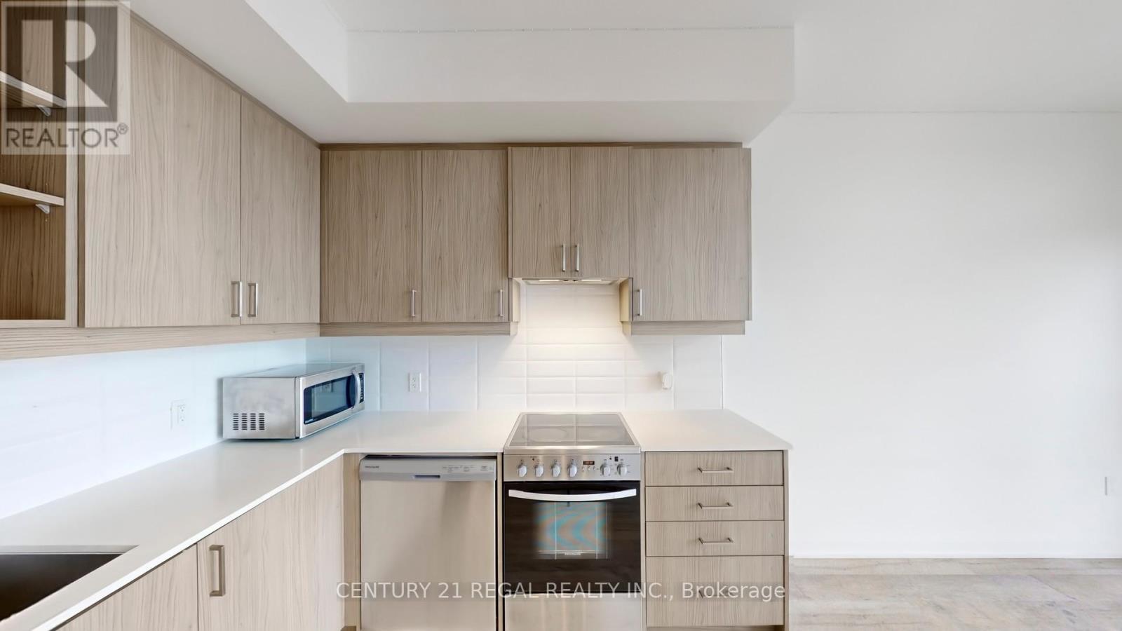 314 - 50 George Butchart Drive, Toronto, ON - Indoor Photo Showing Kitchen