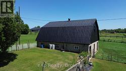 Barn with 5 Box Stalls, Tack Room & Paddock -