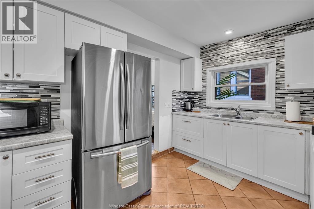 1757 Pierre, Windsor, ON - Indoor Photo Showing Kitchen With Double Sink