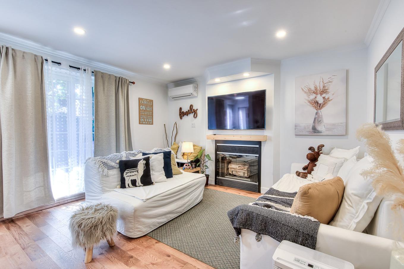 Salon - A-7217 Rue Chouinard, Montréal (Lasalle), QC - Indoor Photo Showing Living Room With Fireplace