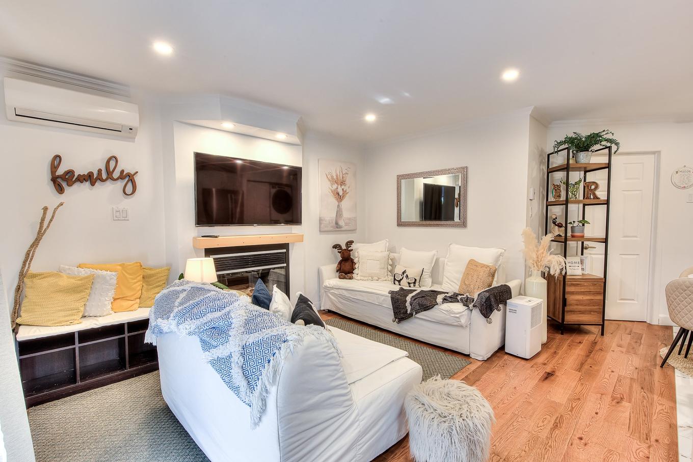 Salon - A-7217 Rue Chouinard, Montréal (Lasalle), QC - Indoor Photo Showing Living Room With Fireplace