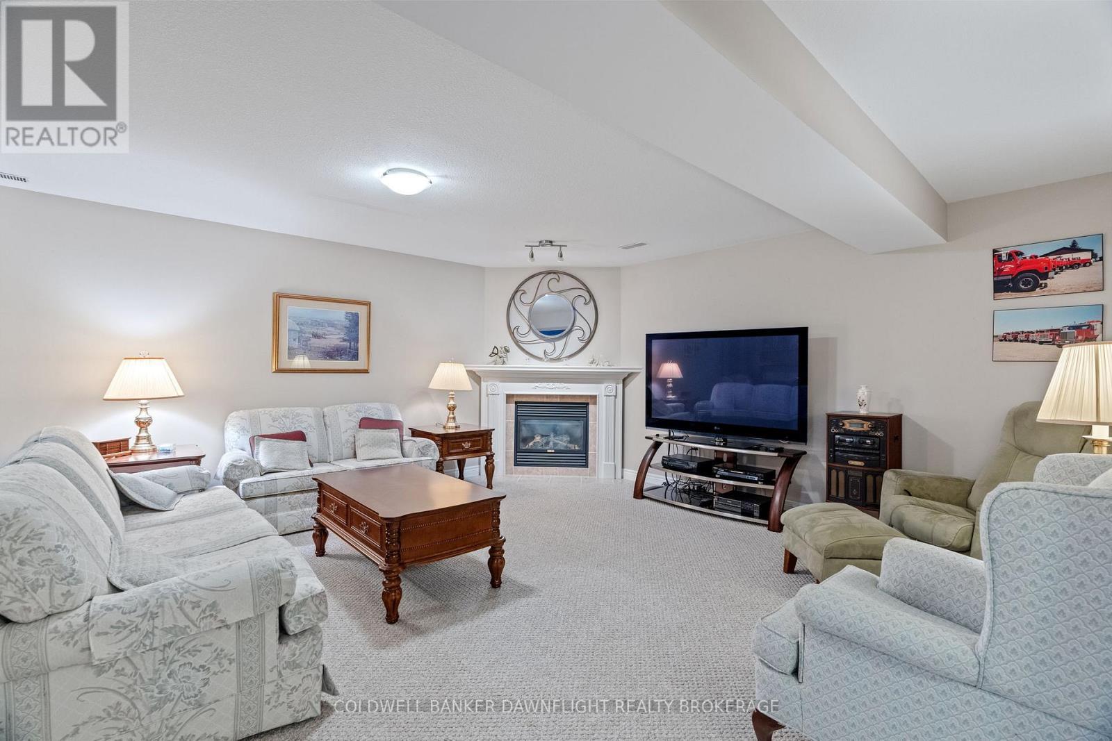 6 Shadow Lane, South Huron (Exeter), ON - Indoor Photo Showing Living Room With Fireplace