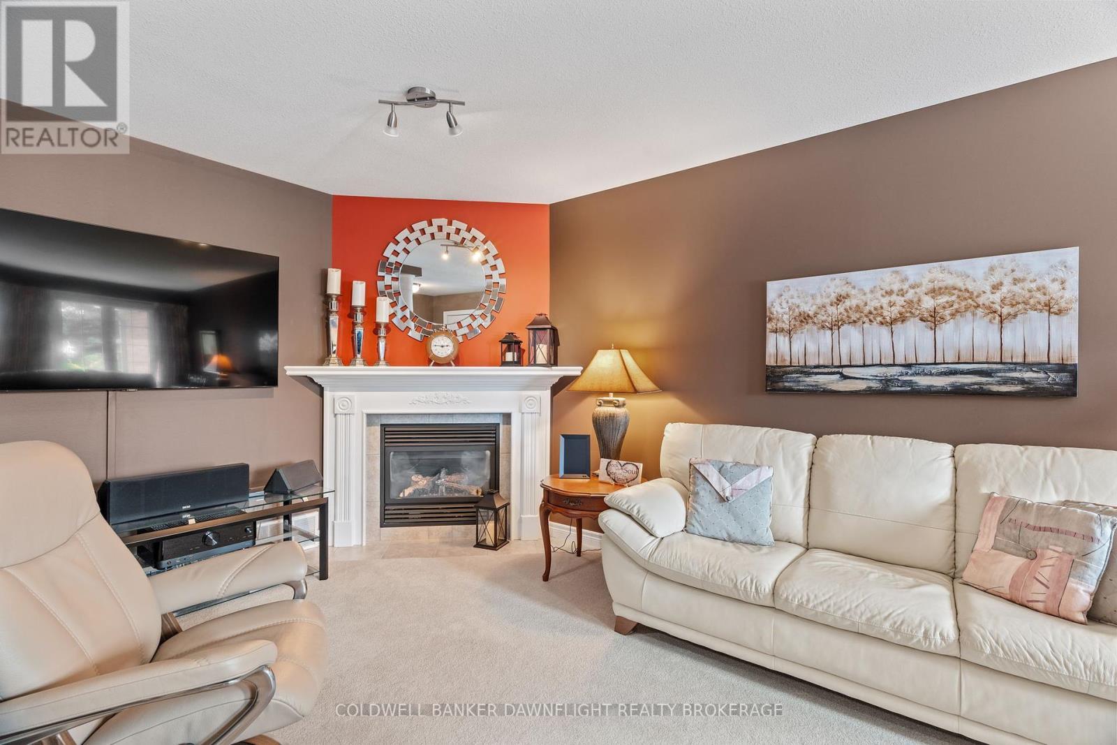 6 Shadow Lane, South Huron (Exeter), ON - Indoor Photo Showing Living Room With Fireplace
