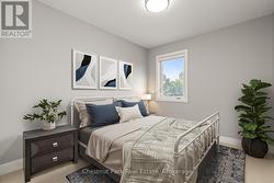 Virtually Staged Upper Bedroom -